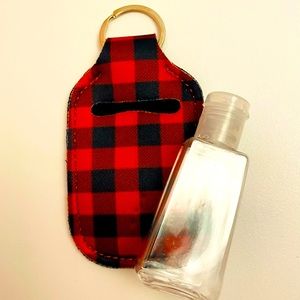 Hand sanitizer holder